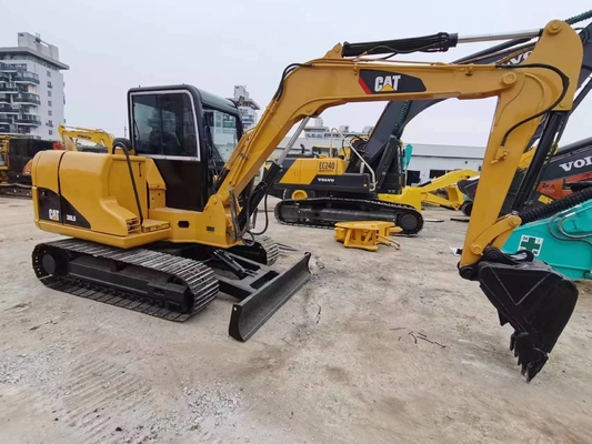 Использованный экскаватор CAT 305.5 306 с вместимостью в 0.31 м3 и массой машины 6000 кг