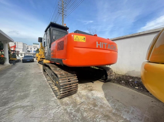 Использованный экскаватор Hitachi ZX210 с вместимостью в 0,45 м3 и массой машины 21500 кг