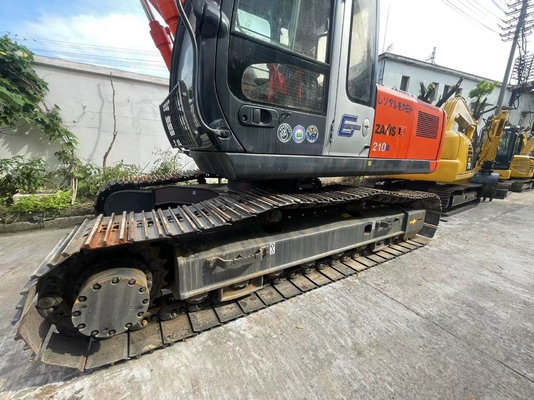 Использованный экскаватор Hitachi ZX210 с вместимостью в 0,45 м3 и массой машины 21500 кг